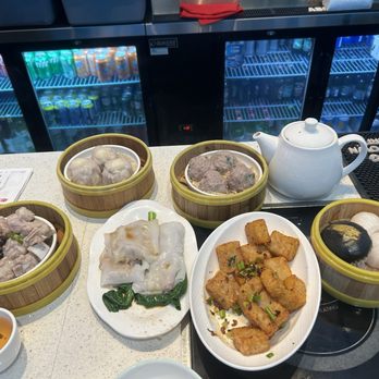Dynasty - T31 .Fried Turnip Cakes W/Xo Sauce T31 Xo, spareribs with T8 .Ribs W/Taro T8, salted egg T46 Molten Egg Yolk Buns T46. - Cantonese Near Me - Boston, Massachusetts
