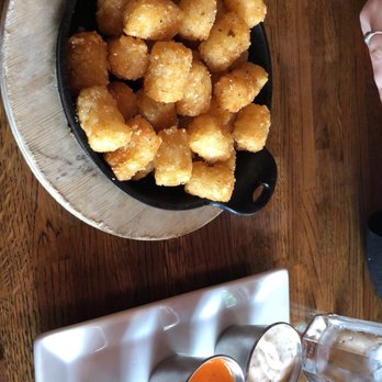 South Kitchen + Bar - Tots with all 3 sauces offered (homemade ranch, red pepper sauce, and raspberry mustard) - Cocktail Bars Near Me - Athens, Georgia