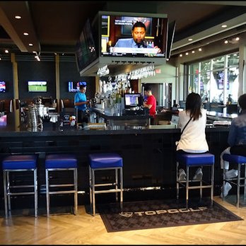Topgolf - As you enter the restaurant, the first thing you'll notice is the GIGANTIC, full-service bar in the center of the room. - Golf Near Me - Roseville, California Topgolf - As you enter the restaurant, the first thing you'll notice is the GIGANTIC, full-service bar in the center of the room. - Golf Near Me - Roseville, California