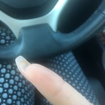 Friendly Nails and Spa - This is just one nail but multiple of my nails aren't supported by the acrylic. - Nail Salons Near Me - La Mirada, California