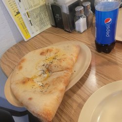 Italiano Cafe - Yes that's a small Calzone. These are the best I've ever had.