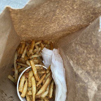 Five Guys - a paper bag full of french fries - Burgers Near Me - Montreal, Quebec