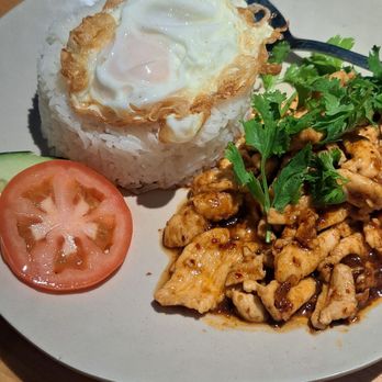 Manaow - Chicken Chili Paste! Chicken is soft and tender the egg is perfect and fried crispy on the edges. - Thai Near Me - Long Beach, California Manaow - Chicken Chili Paste! Chicken is soft and tender the egg is perfect and fried crispy on the edges. - Thai Near Me - Long Beach, California