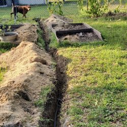 Residential Service Associates - Total of 370 ft of hand dug trench for electric to garage and other shed.