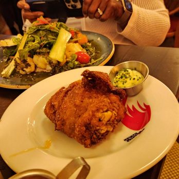 Red Rooster Harlem - Chicken thigh with hot sauce. - American Near Me - New York, New York Red Rooster Harlem - Chicken thigh with hot sauce. - American Near Me - New York, New York