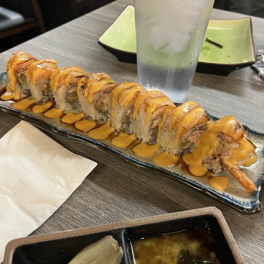 Sushi Tsunami - Exotic salmon roll- lots of sauce - Sushi Bars Near Me - Pleasant Hill, California Sushi Tsunami - Exotic salmon roll- lots of sauce - Sushi Bars Near Me - Pleasant Hill, California