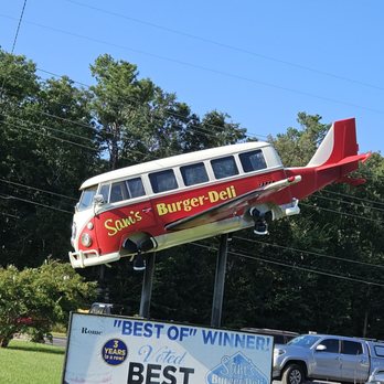 Sam's Burger Deli - A flying VW Vanagon in front of Sams. - Delis Near Me - Rome, Georgia Sam's Burger Deli - A flying VW Vanagon in front of Sams. - Delis Near Me - Rome, Georgia