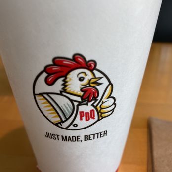 PDQ Chicken - a cup of coffee on a table - Sandwiches Near Me - Jacksonville, Florida