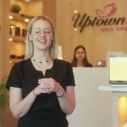 Uptown Med Spa - Front desk with a teammate