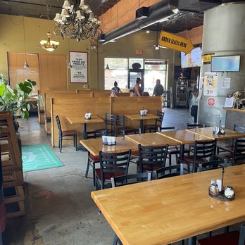 Pizza Roma - tables and chairs in a restaurant - Pizza Near Me - Portland, Oregon Pizza Roma - tables and chairs in a restaurant - Pizza Near Me - Portland, Oregon
