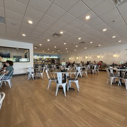 Eggs Up Grill - Overview of part of dining area from our booth along the wall.