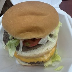 Royal Drive In - Royal burger - has 2 patties, cheese, pickles, tomatoes, lettuce