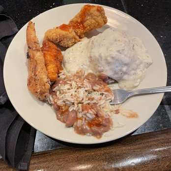 Copeland's - Pictured: Catfish, Herb Chicken strip, Red beans & rice, biscuit w/sausage gravy - Cajun/Creole Near Me - Jacksonville, Florida Copeland's - Pictured: Catfish, Herb Chicken strip, Red beans & rice, biscuit w/sausage gravy - Cajun/Creole Near Me - Jacksonville, Florida