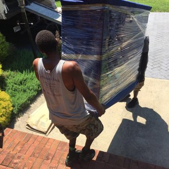 A Woman's Touch Moving - Hard at work! - Movers Near Me A Woman's Touch Moving - Hard at work! - Movers Near Me