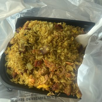 Shang Hai Restaurant - a tray of rice with a spoon in it - Chinese Near Me - Olney, Maryland