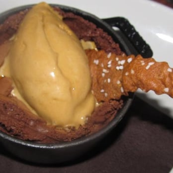 Mindy's Bakery - SKILLET SOUFFLÉ gooey, chocolate skillet soufflé, salted caramel ice cream, pretzels - Desserts Near Me - Chicago, Illinois Mindy's Bakery - SKILLET SOUFFLÉ gooey, chocolate skillet soufflé, salted caramel ice cream, pretzels - Desserts Near Me - Chicago, Illinois