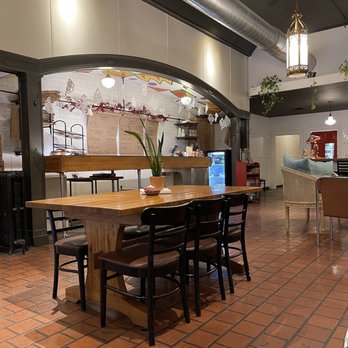 Prairie Pie - a dining area with tables and chairs - Bakeries Near Me - Springfield, Missouri
