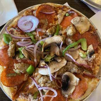 Rotolo's Pizzeria - Deluxe Combination 8" pizza. The onions, bell pepper and mushrooms were so fresh and crisp. Just like I like them. Such a great pizza! - Pizza Near Me - Gulf Breeze, Florida