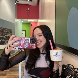 My girlfriend eating a açaí bowl of My girlfriend eating a açaí bowl of