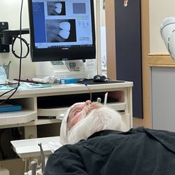 Pro Dental - My husband with his new crowns! He is SO delighted with this dentist. So happy