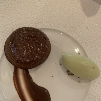Cafe Boulud - Warm chocolate cake with pistachio ice cream Be warned it's not very sweet. - French Near Me - Palm Beach, Florida Cafe Boulud - Warm chocolate cake with pistachio ice cream Be warned it's not very sweet. - French Near Me - Palm Beach, Florida