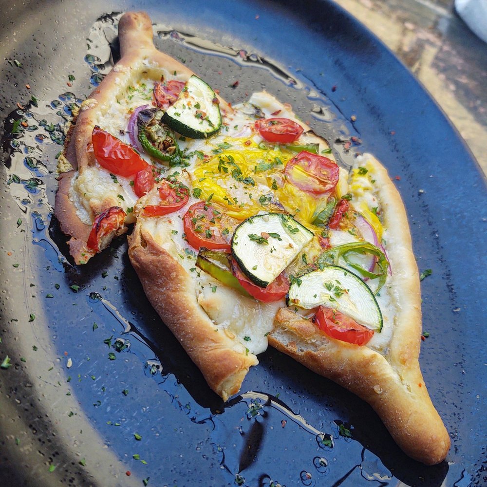 Taxim - Tomato & cheese flatbread appetizer - Greek Near Me - Chicago, Illinois Taxim - Tomato & cheese flatbread appetizer - Greek Near Me - Chicago, Illinois