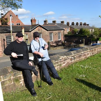Fab 4 Taxi Tours - The wall John and Paul sat between brakes playing in the Church in the back - Tours Near Me Fab 4 Taxi Tours - The wall John and Paul sat between brakes playing in the Church in the back - Tours Near Me