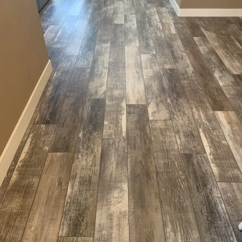 M & M Carpets - a hardwood floor in a living room - Carpeting Near Me - Yucaipa, California M & M Carpets - a hardwood floor in a living room - Carpeting Near Me - Yucaipa, California