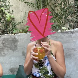 Sorry sis doesn't want to be in pic. Cute drink & background