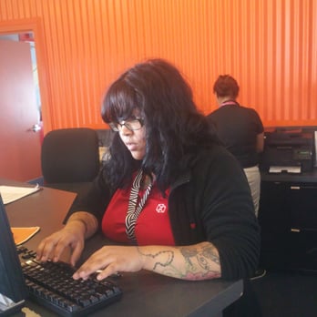 CubeSmart Self Storage - Julisa hard at work.  Nice Tattoos.. - Self Storage Near Me - Flushing, New York