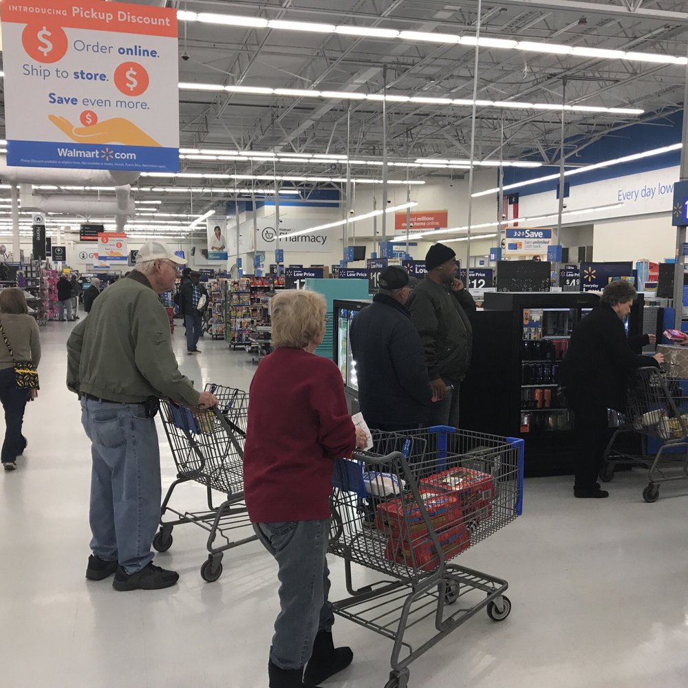 people shopping in a store people shopping in a store