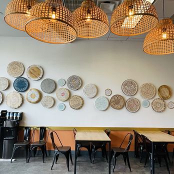 Maast Indian - a dining area with tables and chairs - Indian Near Me - Irvine, California