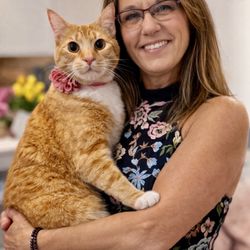 Salty Cat Cafe - Founder Jackie and Sushi, her personal cat that was brought back from death as a tiny kitten.