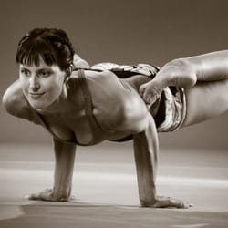 Vimana Yoga - Bow Leg peacock Pose from when Emily was featured in a book about pregnancy and yoga.
