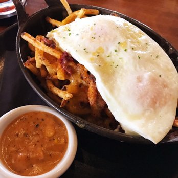 Mash'D - Eggs over fries with chorizo & cheddar with gravy on the side. - New American Near Me - Frisco, Texas Mash'D - Eggs over fries with chorizo & cheddar with gravy on the side. - New American Near Me - Frisco, Texas