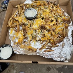 No Frills Grill & Sports Bar - Texas cheese fries! Sooooo good.