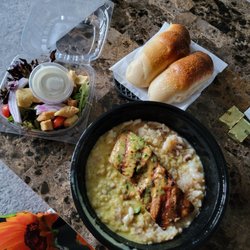 Nonna Rosa Traditional Italian Kitchen - Grilled salmon with peach pesto over seafood risotto. Meal came with side salad and their delicious house made rolls.