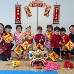 Lake Merritt Child Care Center - Family Bridges - LMCC students celebrating Chinese New Year