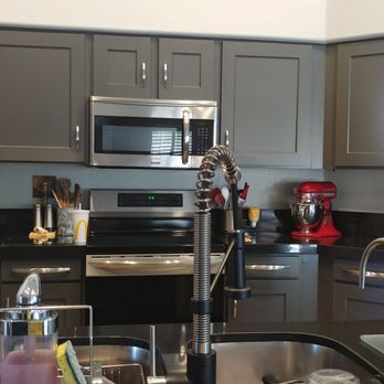 Ray Of Light Artistic Design - Gap under top cabinet door different on left and right of microwave. - Refinishing Services Near Me - Tempe, Arizona