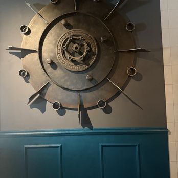 District Kitchen - Anderson Lane - Metal art.... Also their logo - New American Near Me - Austin, Texas