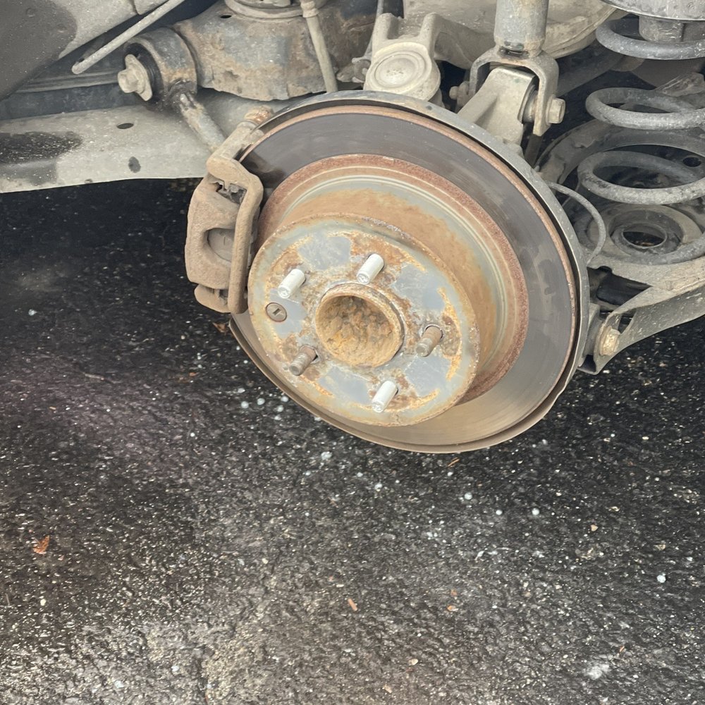 Tires R Us - Picture of the three new studs that had to be installed after melting the lug nut out. - Tires Near Me - Blue Island, Illinois