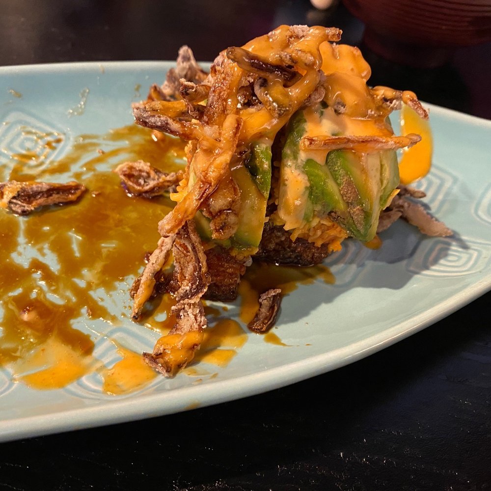 KANZI - Mostly eaten Castle Rock Roll, fried rice, with crab, avacado, and fried onion pieces. My favorite! - Sushi Bars Near Me - The Colony, Texas