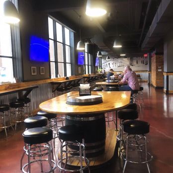 Pour Taproom - Wilmington - Downstairs seating - Beer Bar Near Me - Wilmington, North Carolina Pour Taproom - Wilmington - Downstairs seating - Beer Bar Near Me - Wilmington, North Carolina