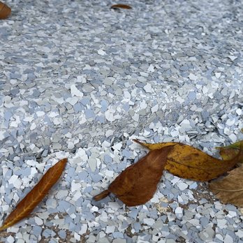 Garage Experts - Close up of flake. - Flooring Near Me - Katy, Texas Garage Experts - Close up of flake. - Flooring Near Me - Katy, Texas