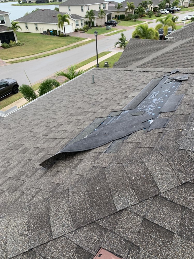 Slide of E&C Roofing and More