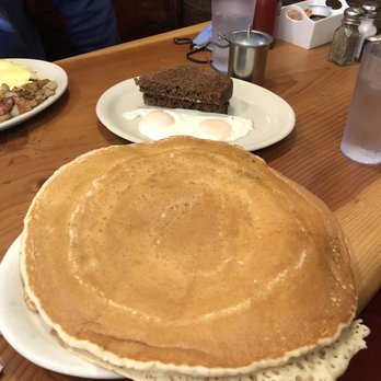 Potato Shack Cafe - Ginormous pancake, basted eggs and "squaw" (should prob rename ...) bread. - American Near Me - Encinitas, California Potato Shack Cafe - Ginormous pancake, basted eggs and "squaw" (should prob rename ...) bread. - American Near Me - Encinitas, California