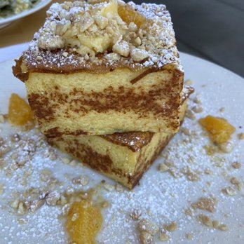 Early Bird - Brioche French Toast. Topped with orange butter and nuts with apple sauce between the two pieces of toast 5/5 - New American Near Me - Fullerton, California