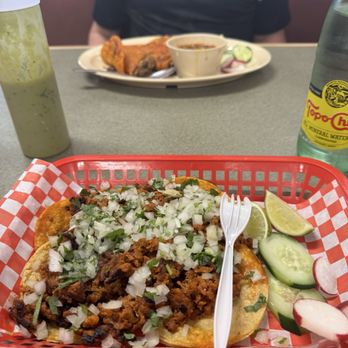 La Birrieria - Front Al pastor 4 Mini Tacos, back Combo de 4 Quedabirrias - Tacos Near Me - San Antonio, Texas
