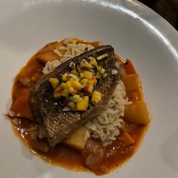 Biddy O'Malley's - Snapper with mango salsa basmati rice roasted tomato - Irish Pub Near Me - Northvale, New Jersey Biddy O'Malley's - Snapper with mango salsa basmati rice roasted tomato - Irish Pub Near Me - Northvale, New Jersey