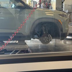 Les Schwab Tire Center - My car lifted while the new tires are being balanced.